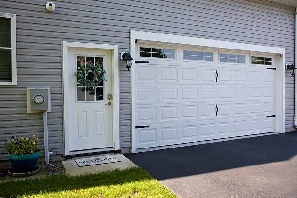 24/7 Emergency Garage Door Panel Replacement experts in Herington, KS